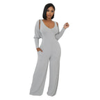 Modern eprolo cape-sleeve tailored jumpsuit, stylish top with elegant cape sleeves, perfect for contemporary fashion.