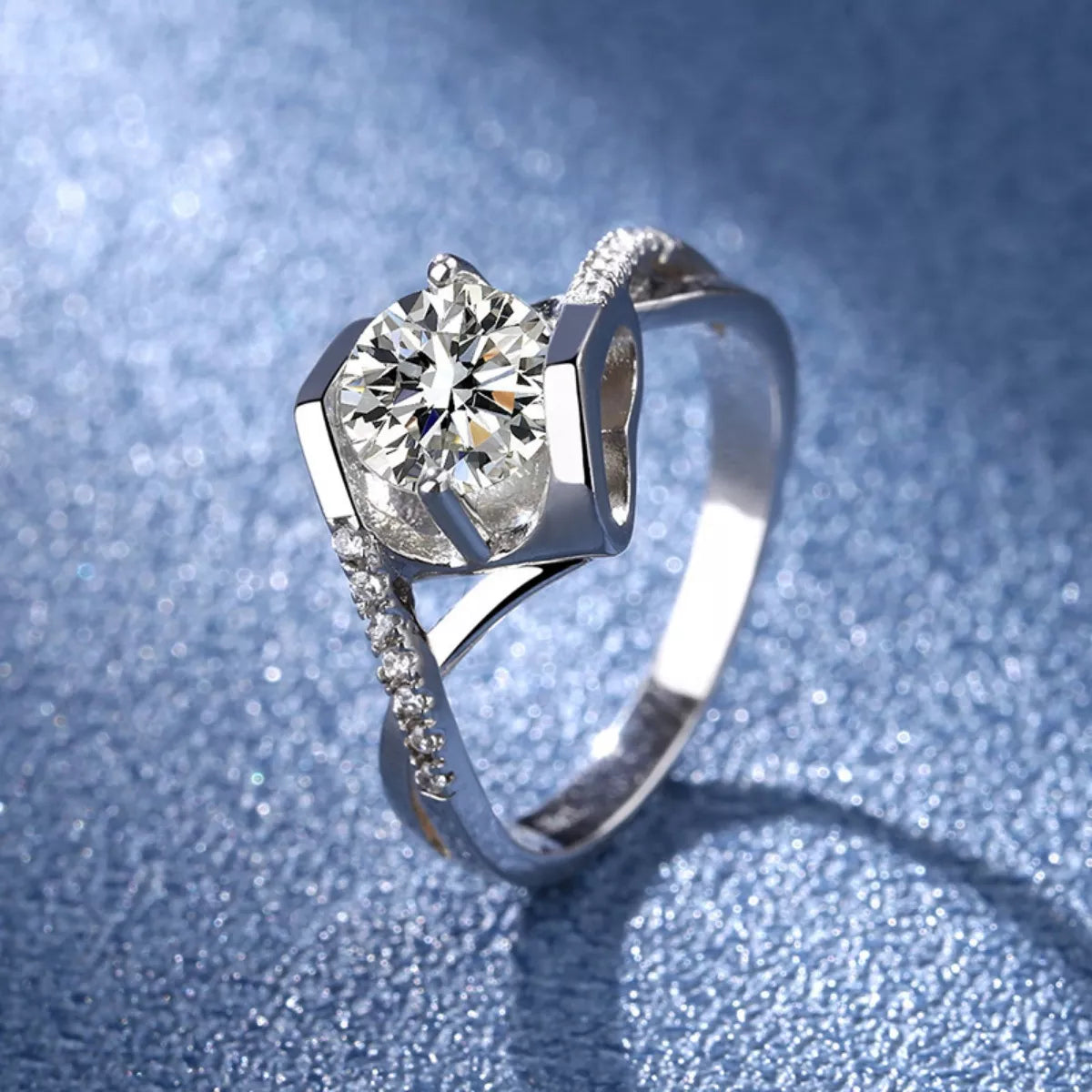 Elegant 1 Carat Moissanite ring in sterling silver featuring a sparkling central stone and intricate band design.