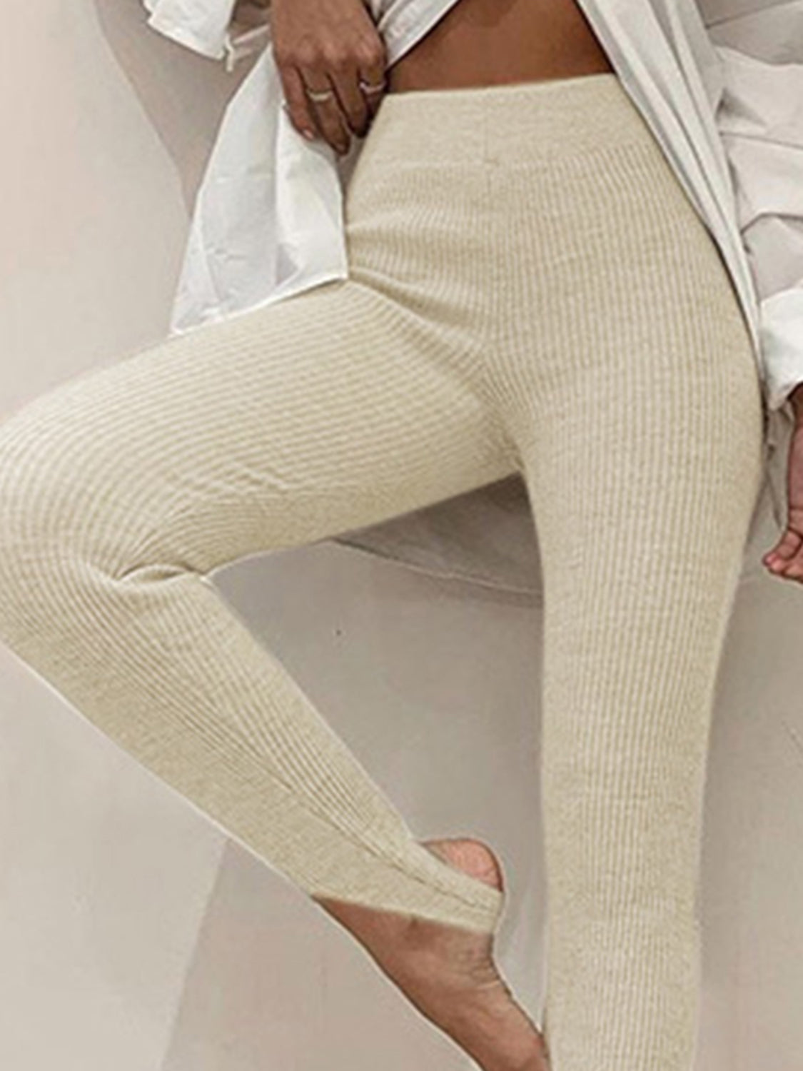 Plush Fashion Hub ribbed mid waist leggings in soft fabric, fitted design, shown in a neutral color on a model.