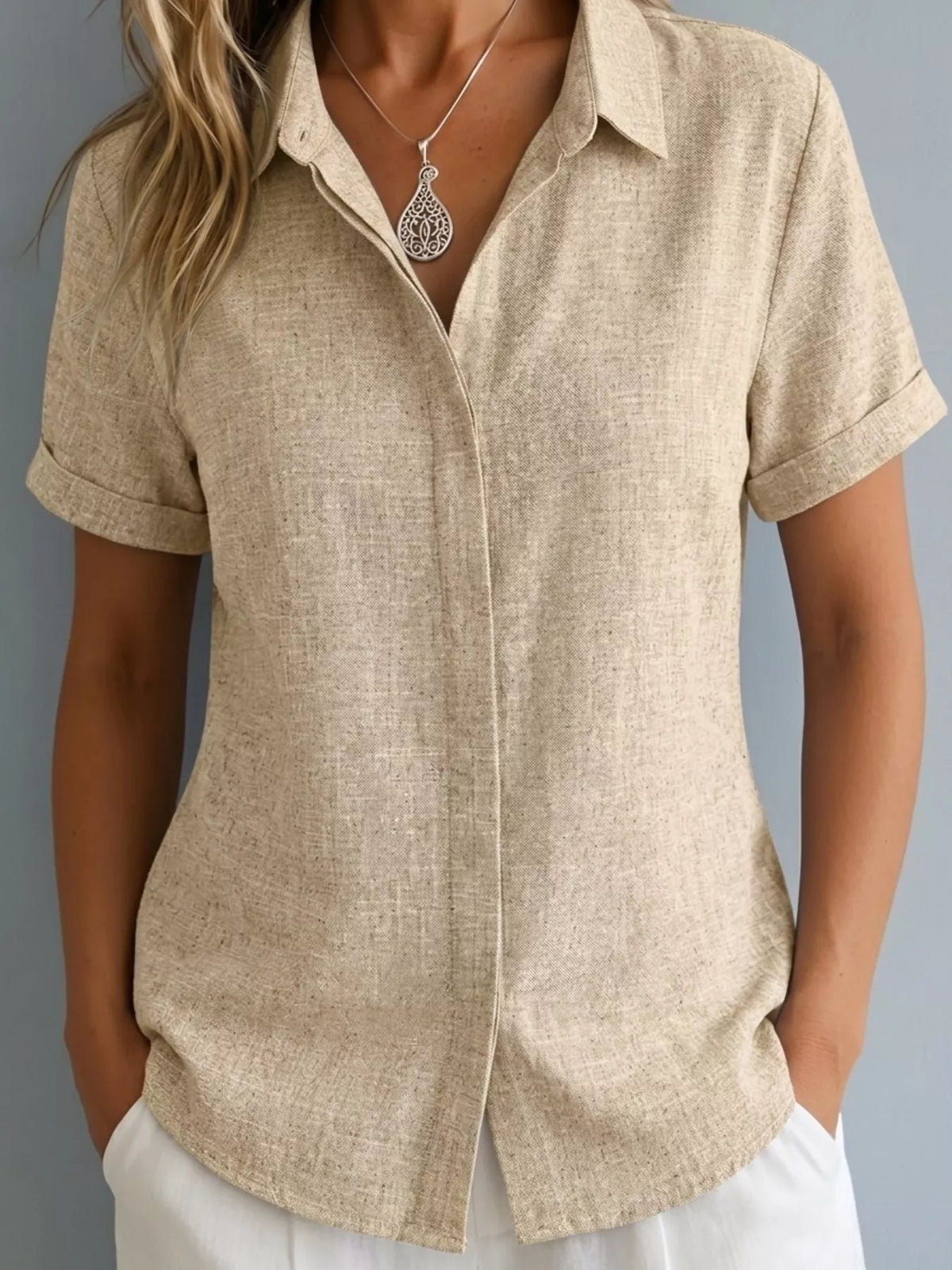 Plus size collared short sleeve shirt from Trendsi, featuring a classic design and full-size fit, displayed on a neutral background.