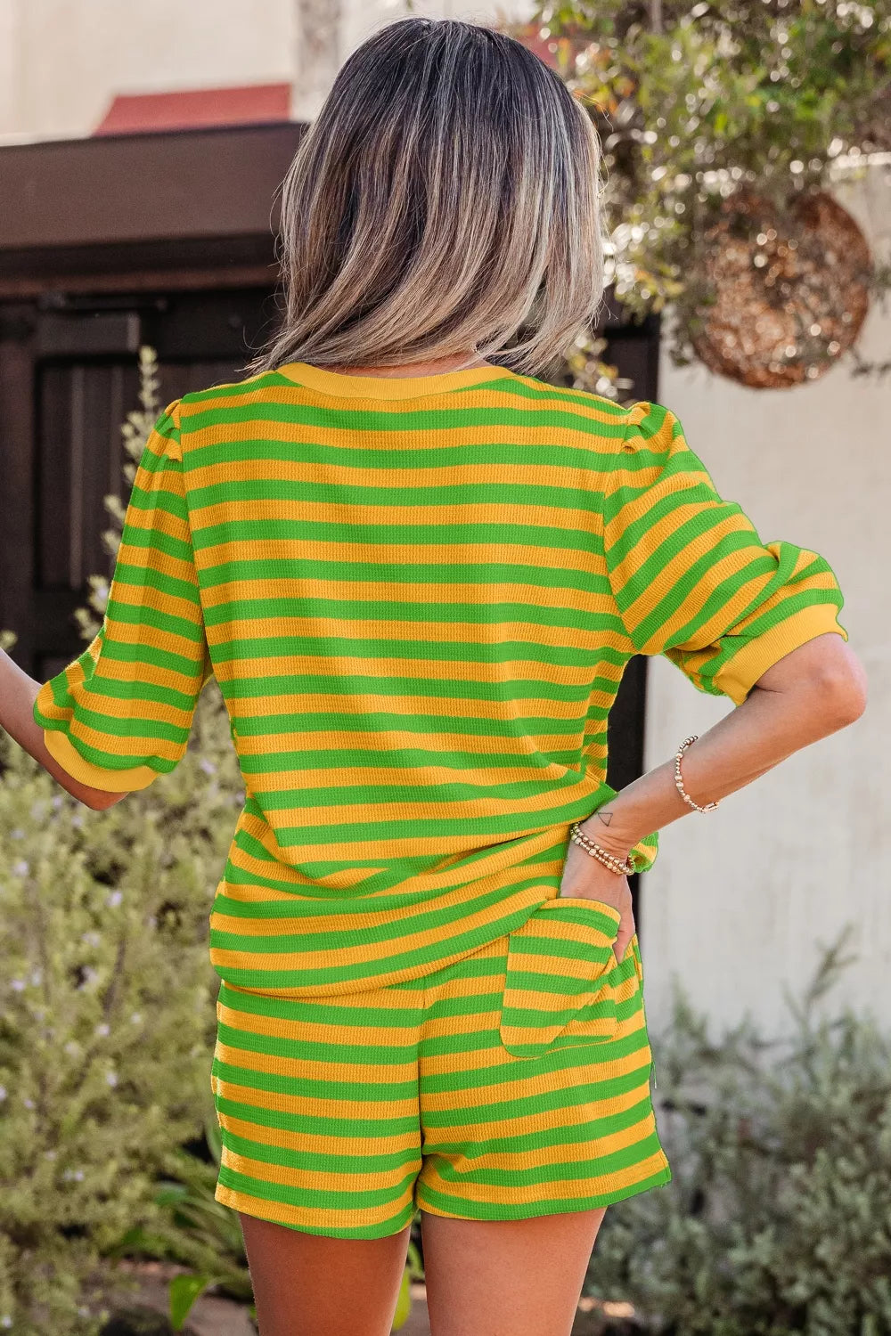 Striped puff sleeve top and drawstring shorts set by Plush Fashion Hub, casual matching outfit with bright stripes and comfortable fit.