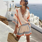 Women's V-neck top and shorts casualwear set by FitiqueFit, featuring a comfortable V-neck blouse and matching shorts.