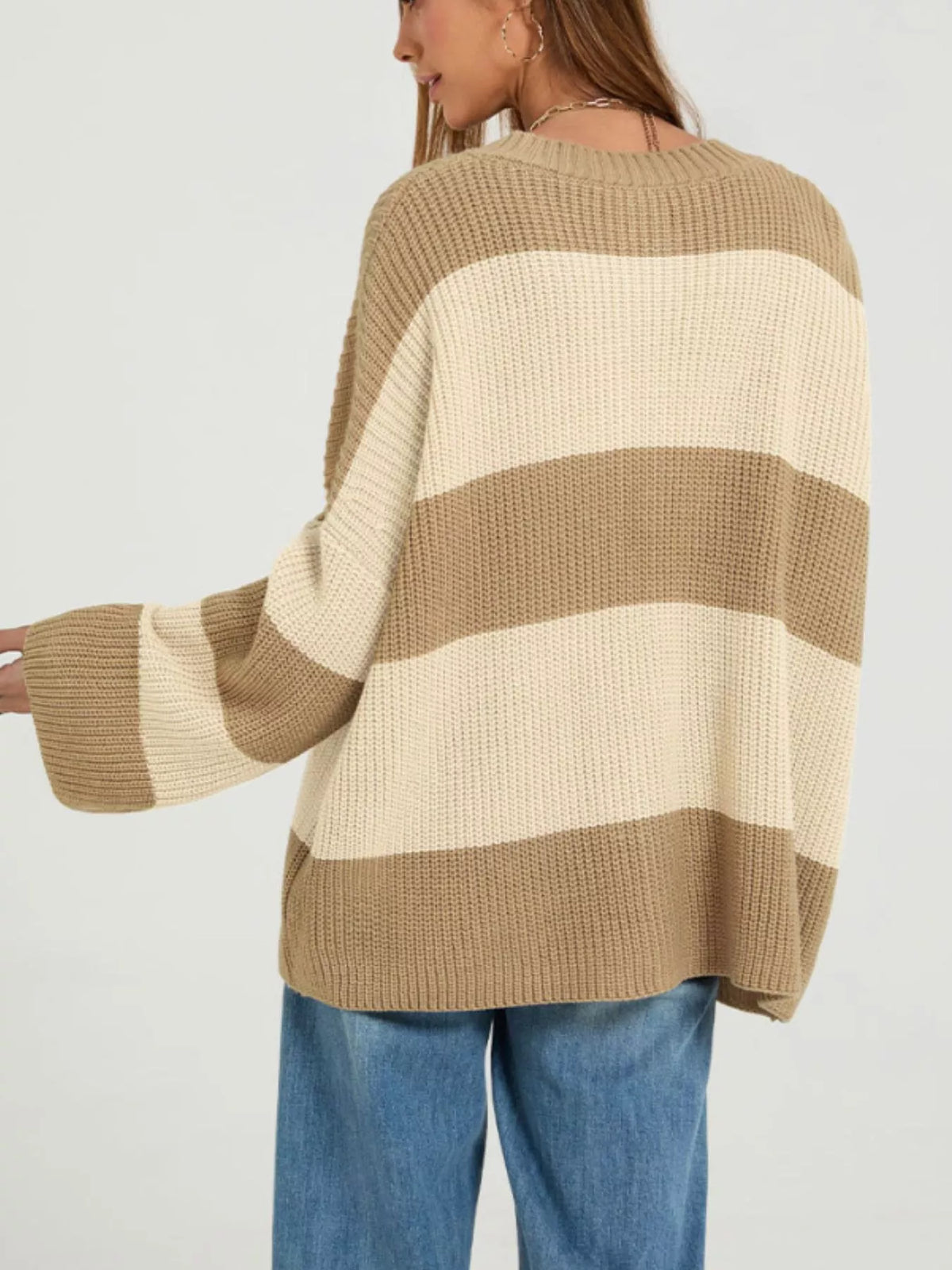 Color block striped button-up cardigan by Trendsi, featuring vibrant color blocks and a classic button-up design.