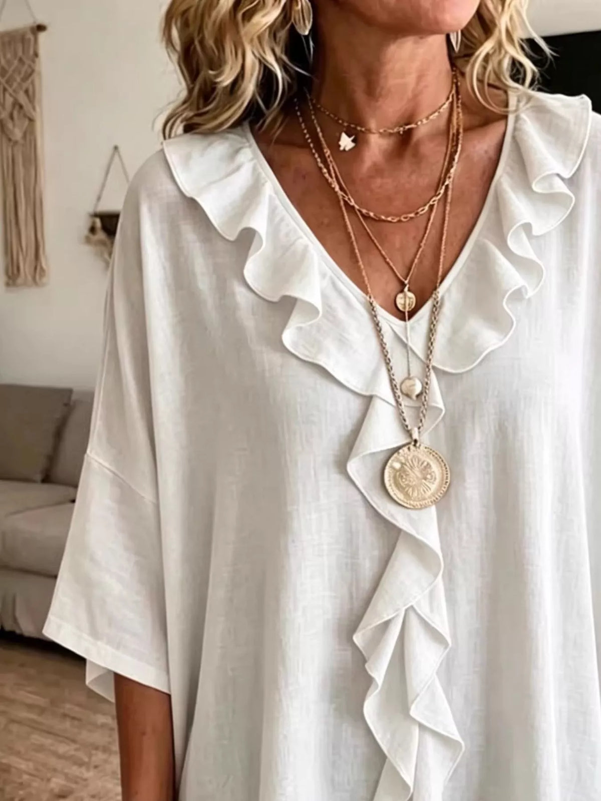 Plus size full ruffle V-neck blouse with 3/4 sleeves by Plush Fashion Hub, featuring a flattering fit and feminine ruffle details.