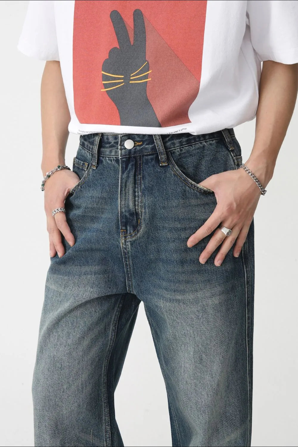 Plush Fashion Hub bootcut denim jeans with front and back pockets, classic blue wash, and relaxed fit.