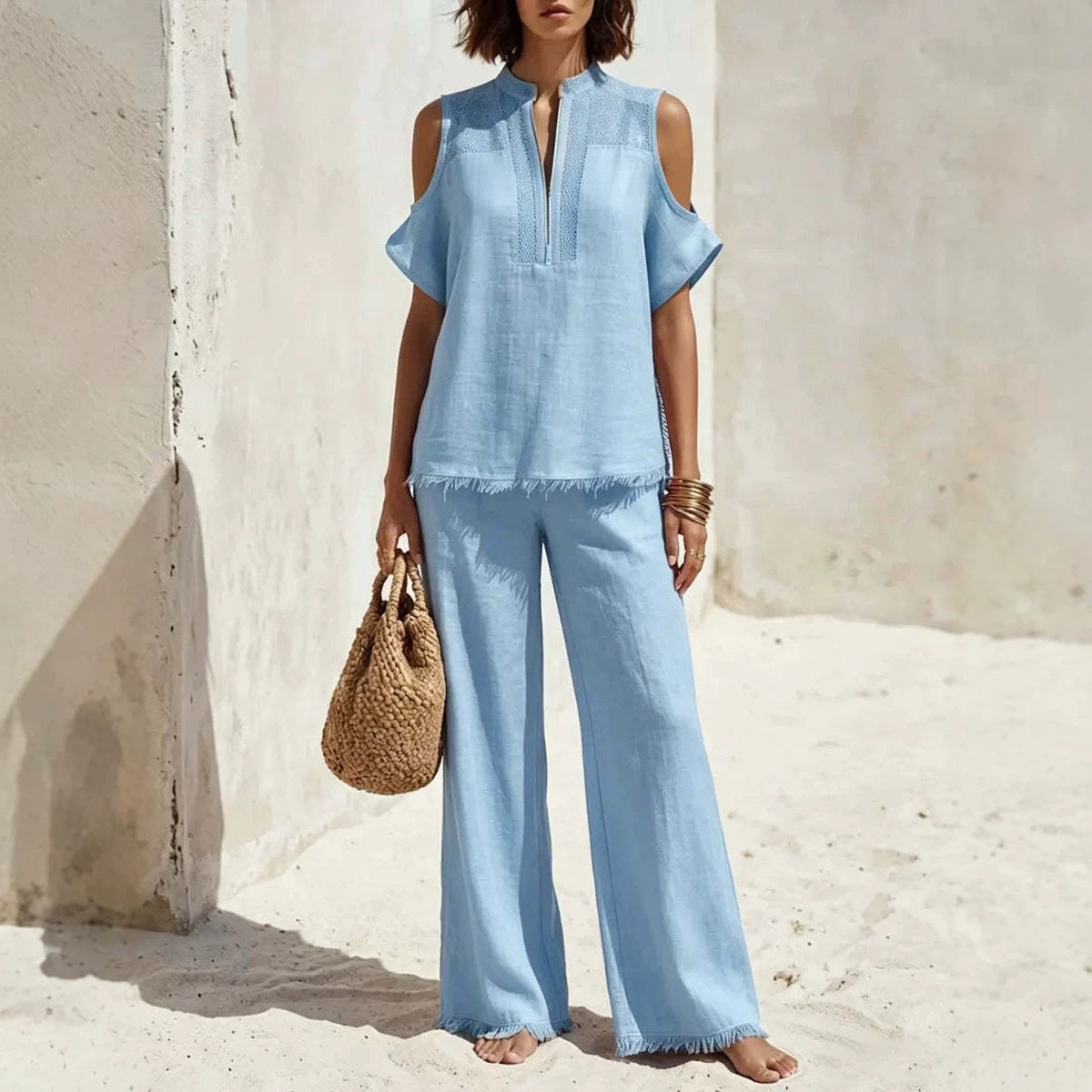 Women's off-shoulder linen blend pantsuit set from Plush Fashion Hub, featuring short sleeves and a stylish two-piece design.
