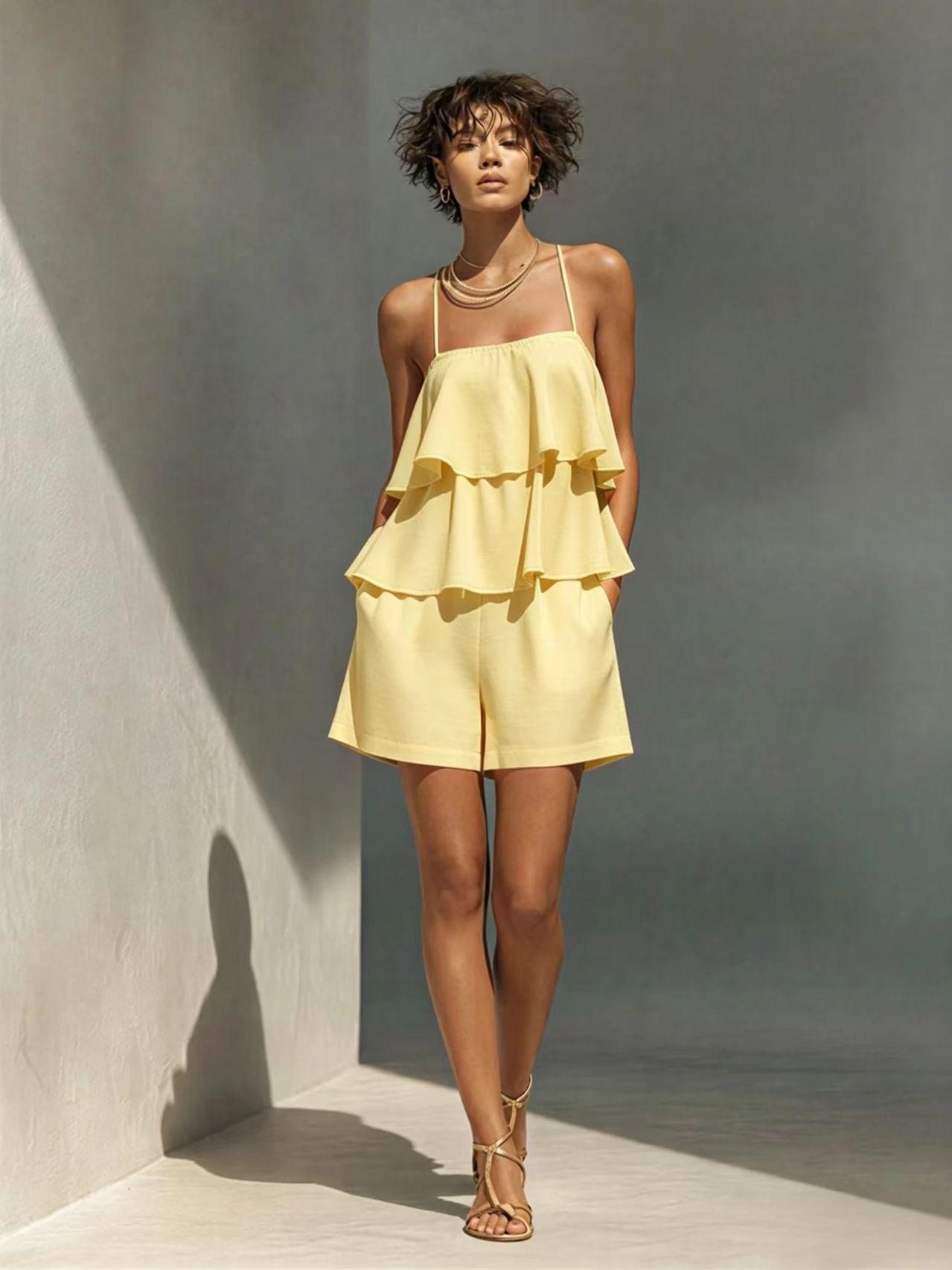Women's multi-layer ruffle camisole and shorts casualwear set by FitiqueFit, featuring layered ruffle details and comfortable fabric.