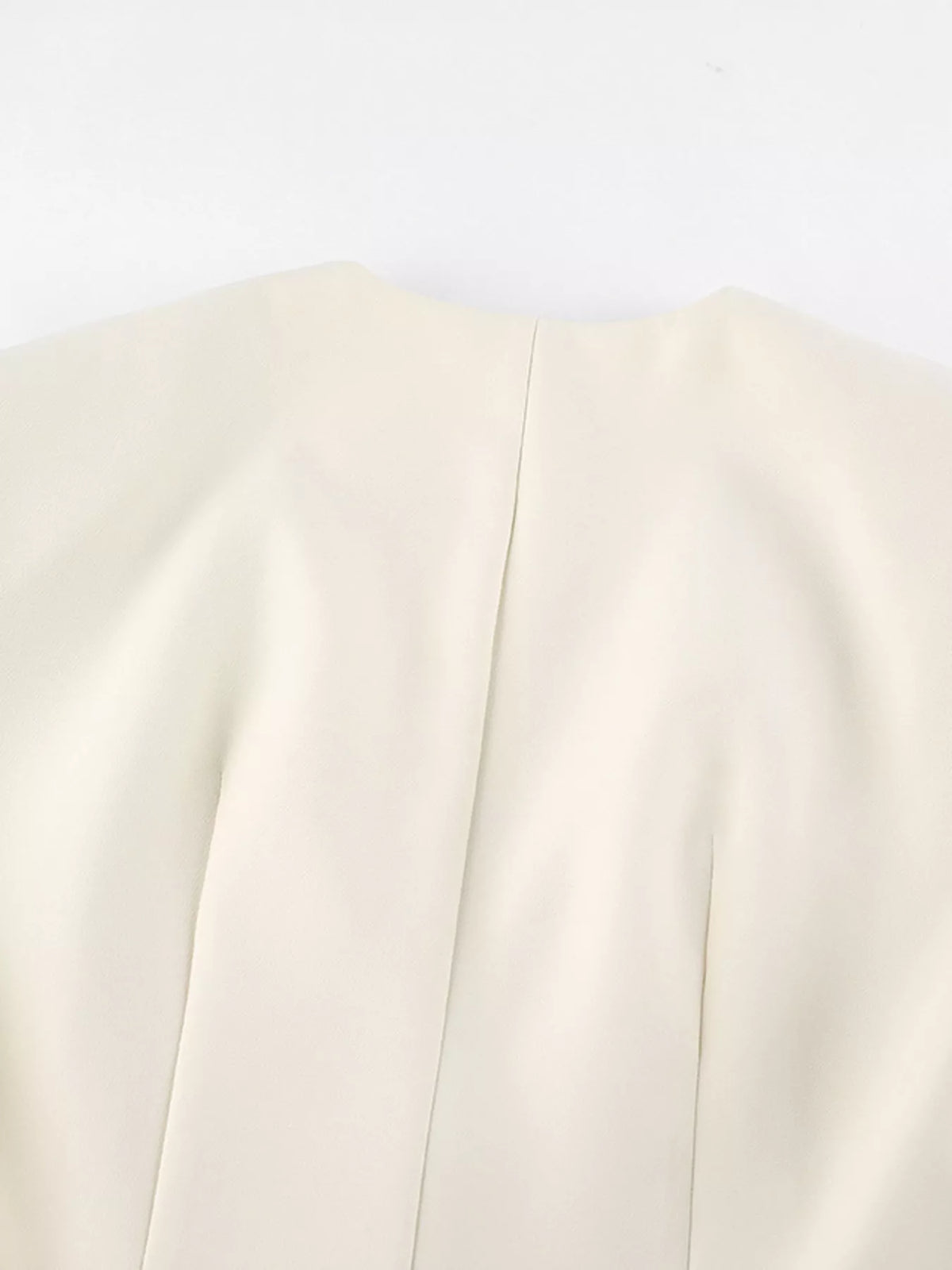Trendsi women's v-neck button-up blazer with structured shoulders, tailored fit, and classic design for a stylish professional look.