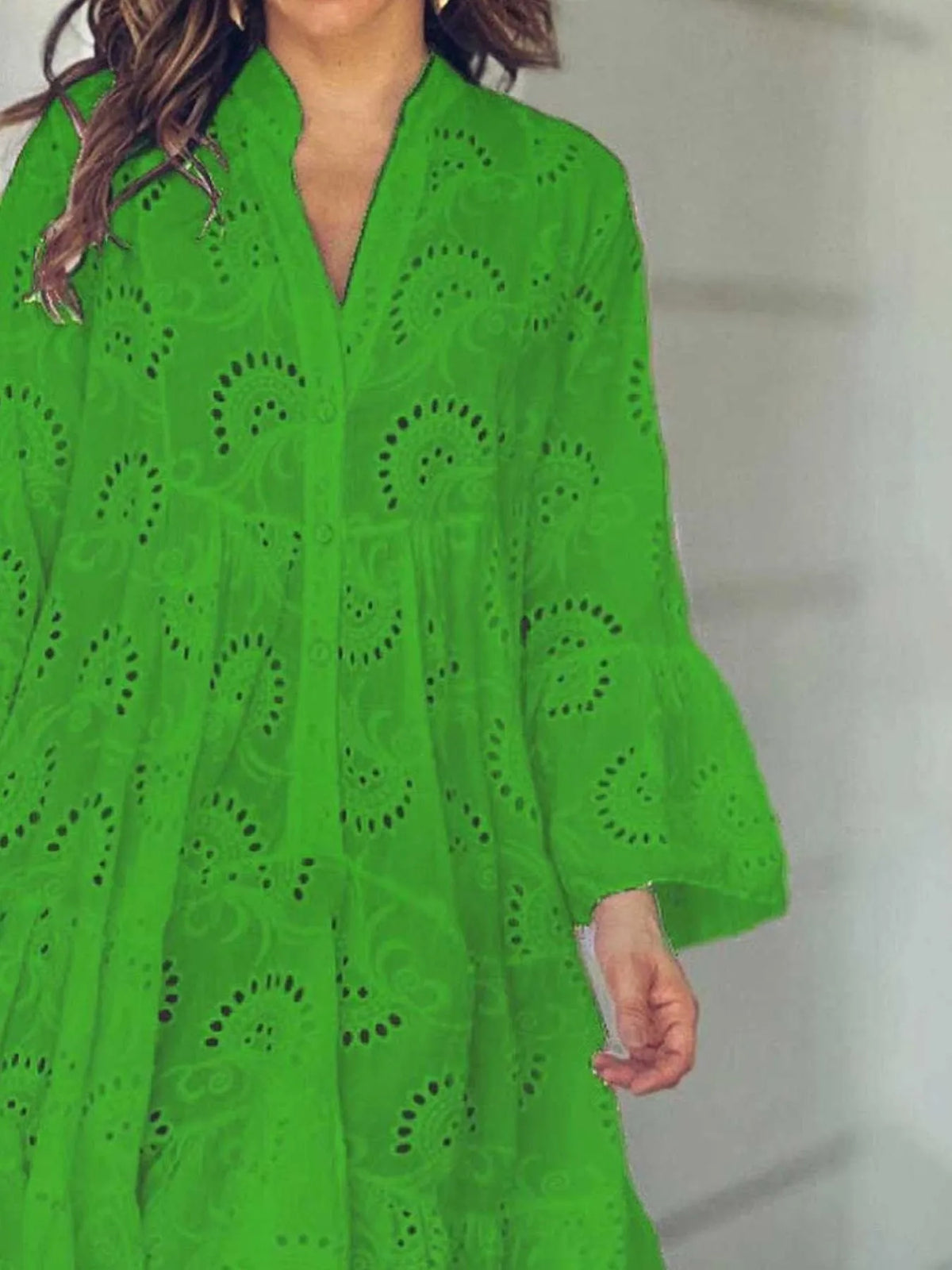 Plus size full-length eyelet ruffled hem tiered dress by Trendsi, featuring a flowy design and layered tiers with eyelet detailing.