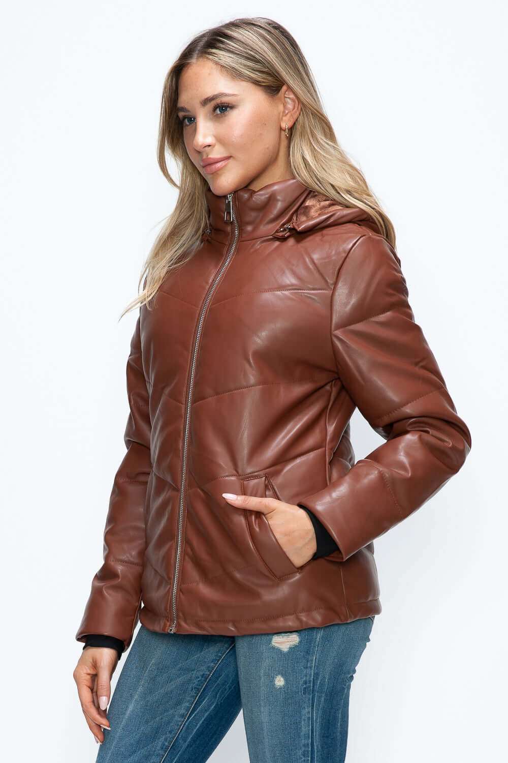 Pocketed zip-up puffer jacket with removable hood in brown pleather.