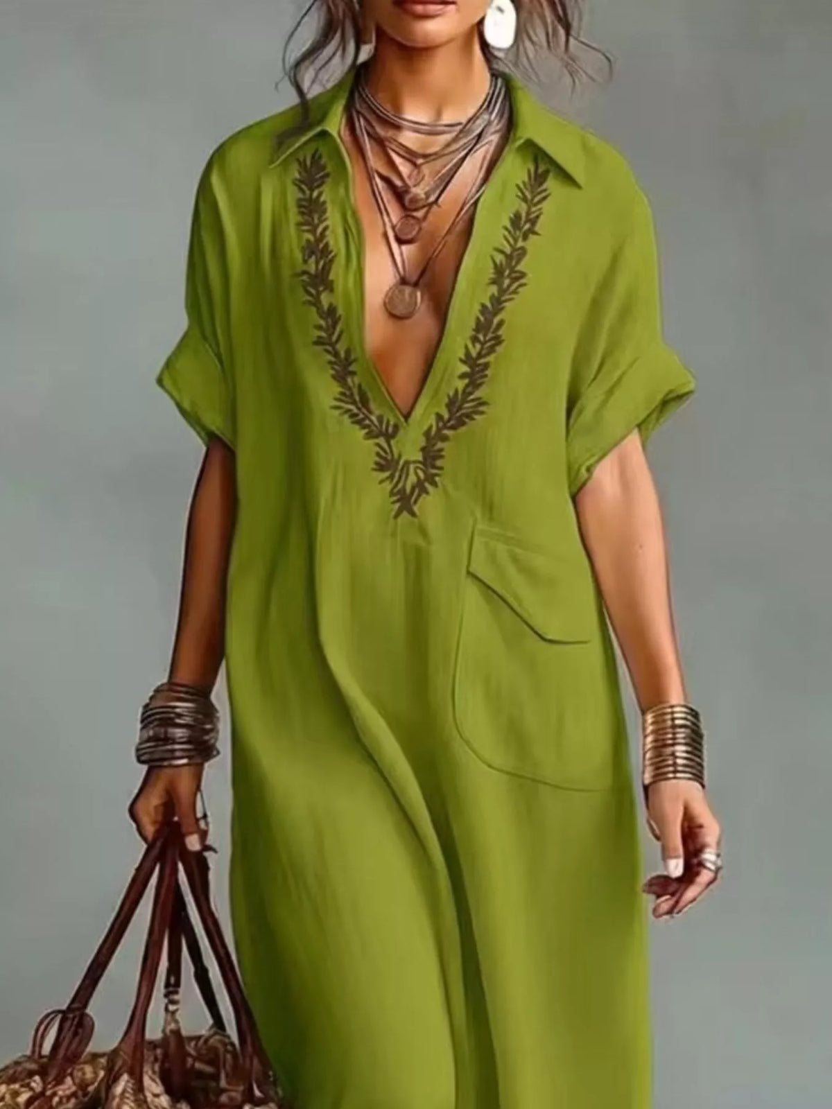 Plus size bohemian embroidered maxi dress with flowing fabric and intricate embroidery, perfect for casual or boho style.