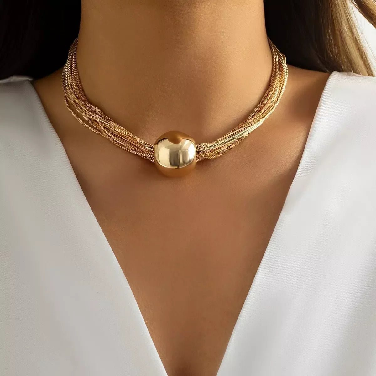 Multi-layered adjustable necklace from Plush Fashion Hub featuring layered chains and a stylish, versatile design.