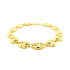 11.0mm 14k yellow gold puffed mariner link bracelet with polished finish, showcasing its chunky, textured design.