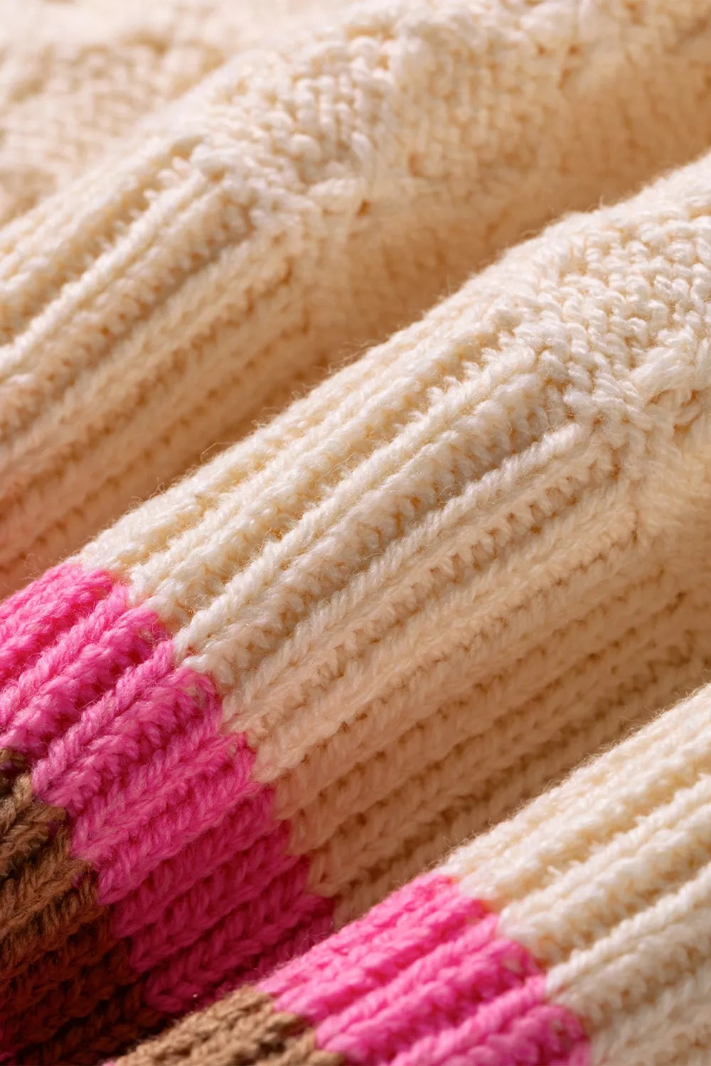 Women's striped colorblock textured drop shoulder sweater by Trendsi, featuring bold stripes and cozy knit fabric.