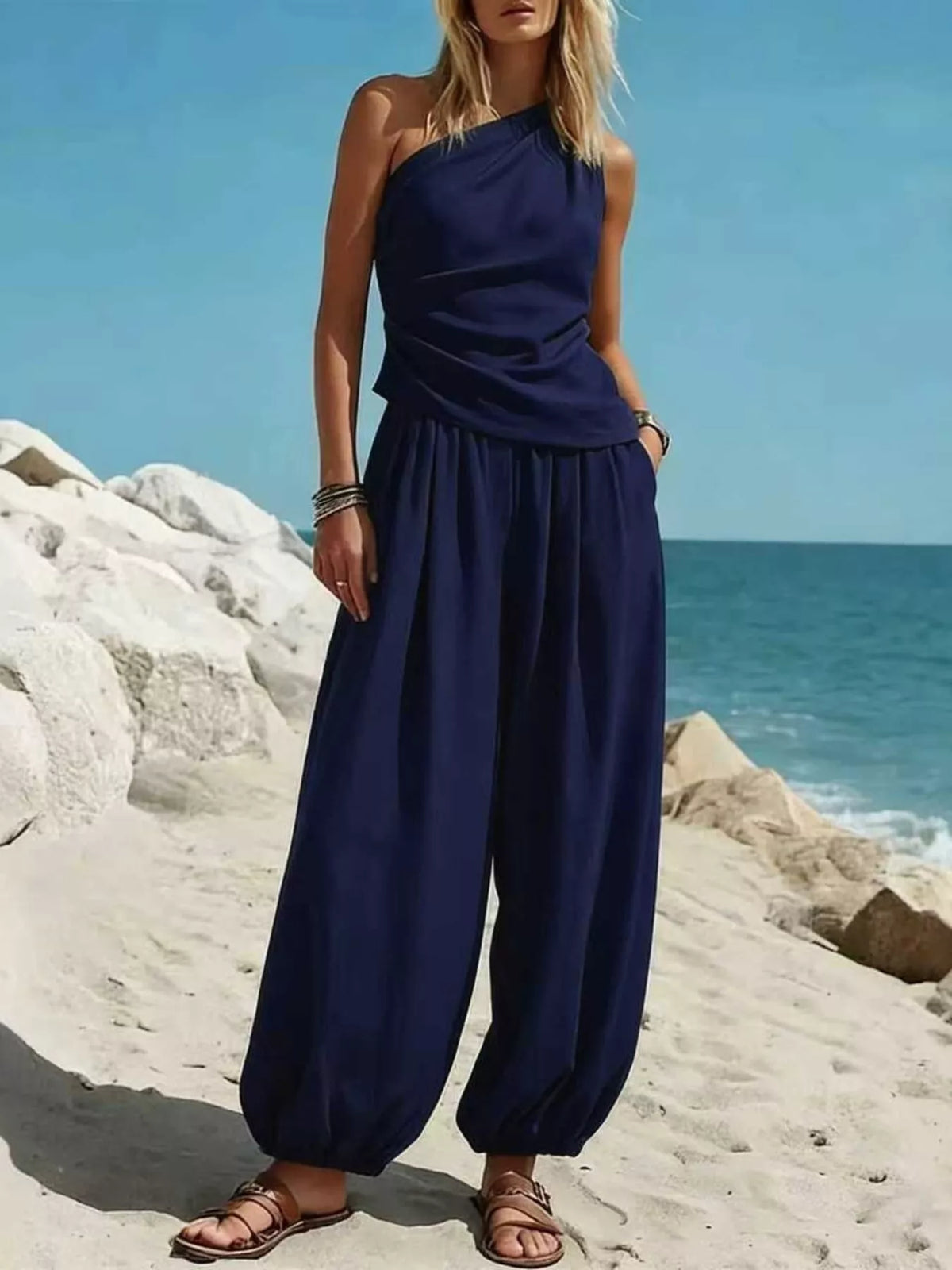 Plus size one-shoulder top and wide-leg pants set by Plush Fashion Hub, stylish and comfortable women's fashion ensemble.