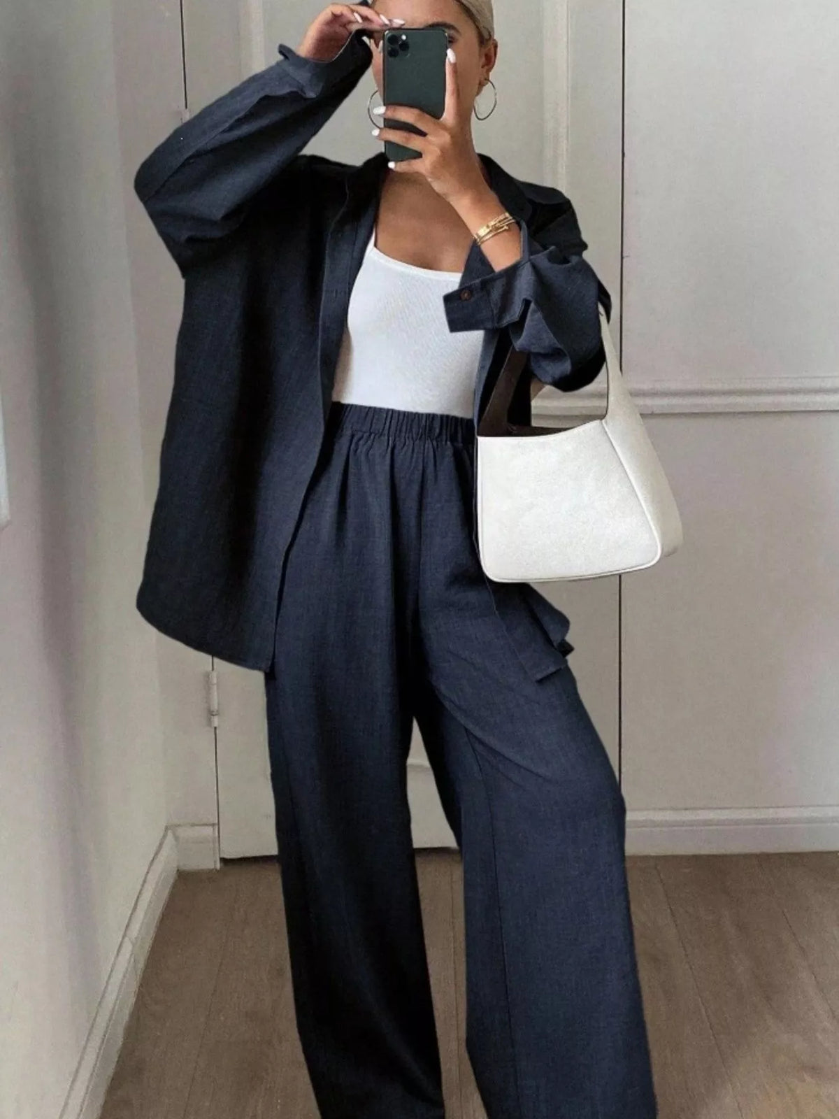 Trendsi long sleeve button-up shirt and wide-leg pants set, stylish casual outfit, shown in natural fabric and relaxed fit.