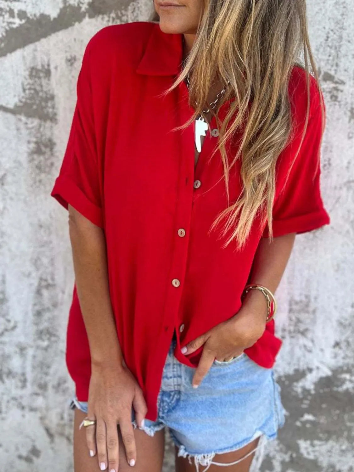 Women's collared button-down blouse from Plush Fashion Hub, half sleeve office top in a stylish, professional design.