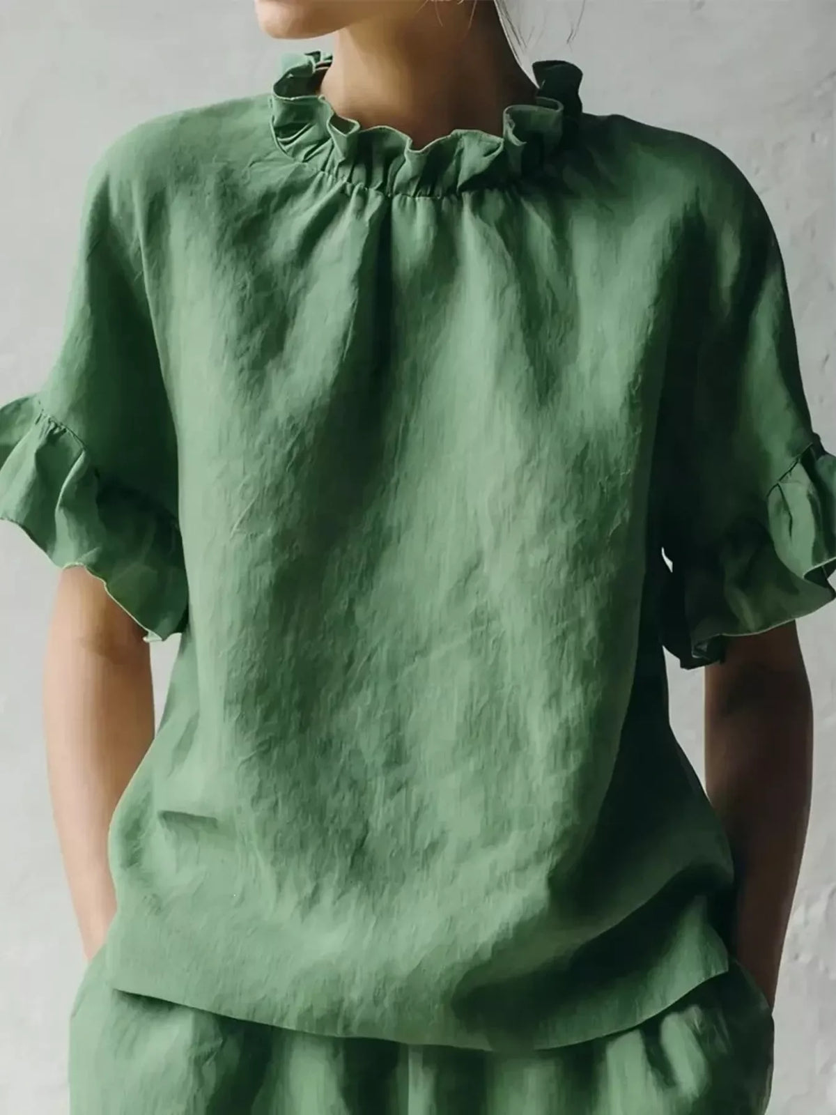 Plus size ruffled neck half sleeve blouse by Plush Fashion Hub, featuring a stylish ruffled collar and full coverage fit.