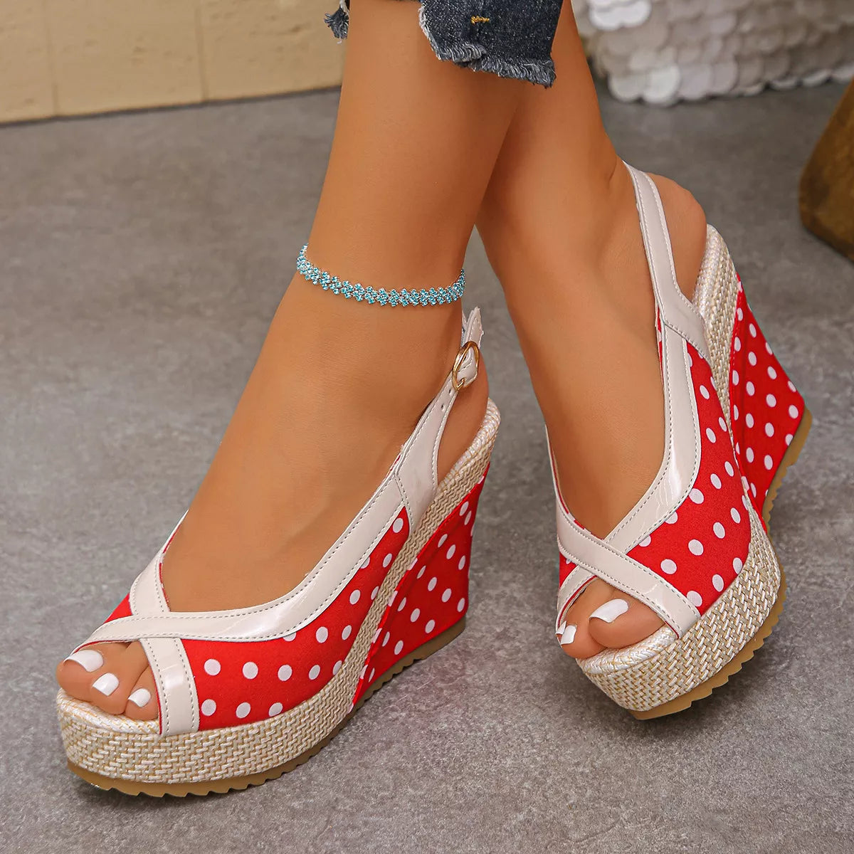 Polka dot peep toe wedge sandals by Trendsi, showcasing stylish footwear with platform soles and ankle straps.
