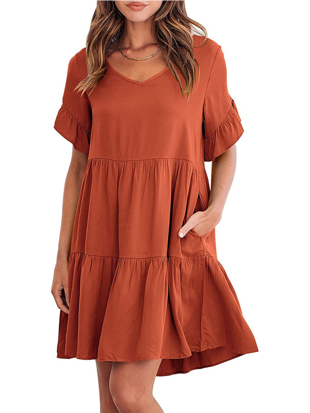 Lightweight rayon mini dress with ruffled sleeves, tiered design, and pockets, by Plush Fashion Hub, perfect for casual summer wear.