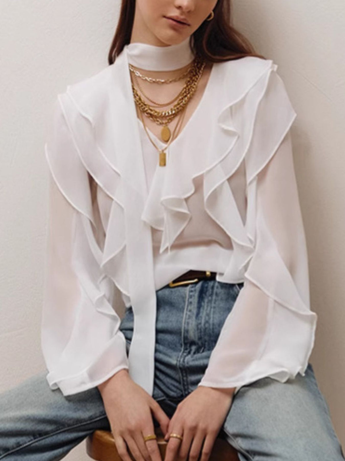 Elegant chiffon blouse with ruffle trim and tie-neck detail from Plush Fashion Hub, featuring a flowy, feminine design.