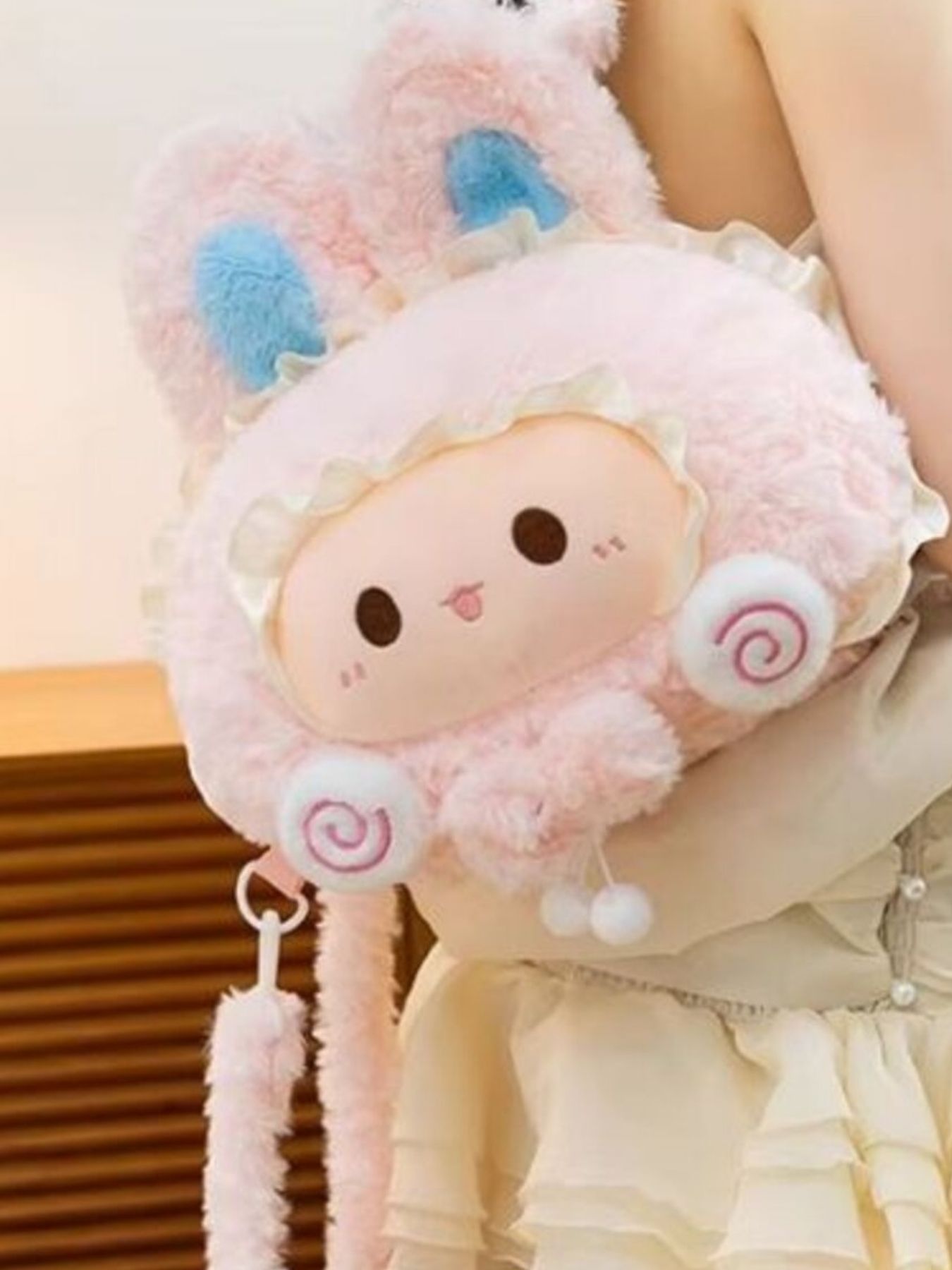 Soft plush bunny backpack by Trendsi featuring whimsical woolen design and cute bunny face, perfect for kids or playful styles.