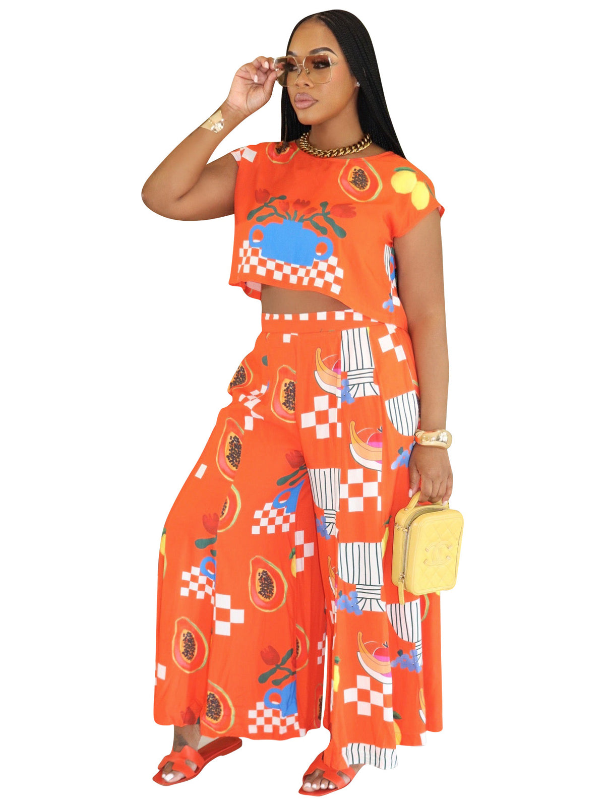 Printed two-piece top and straight-leg pant set from Plush Fashion Hub, featuring a stylish matching blouse and pants.
