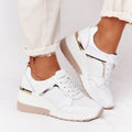 White mesh platform sneakers featuring gold metallic accents, lace-up fronts, and a beige rubber sole.