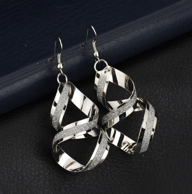Fashion trendy earrings and ear studs from Trendy Attic Store01, showcasing stylish jewelry with sleek designs