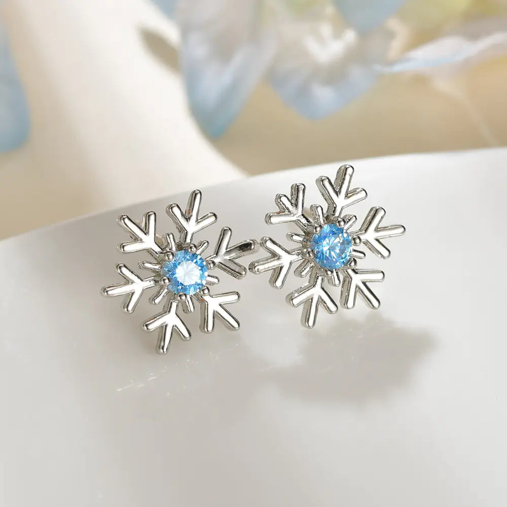 Sterling silver flower stud earrings featuring a trendy and versatile design, perfect for everyday wear.