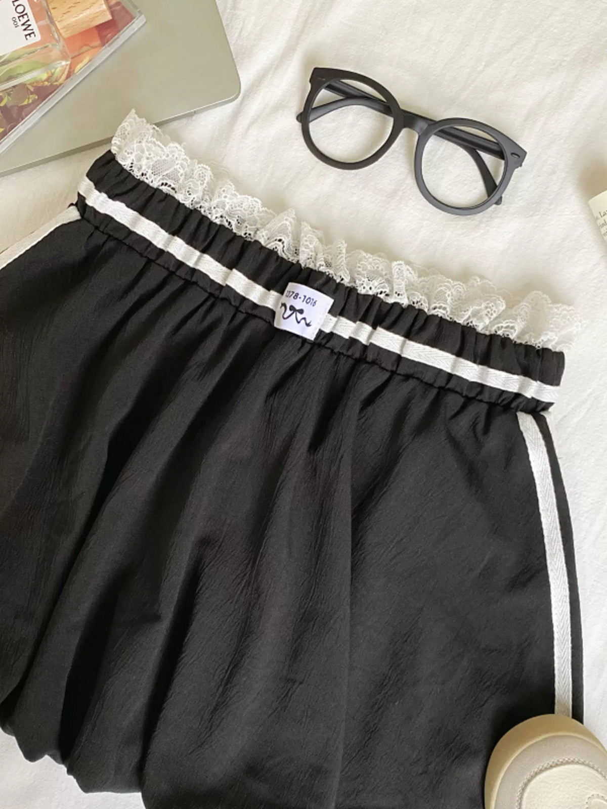Plush Fashion Hub lace trim elastic waist mini skirt with a fitted silhouette and delicate lace detailing.