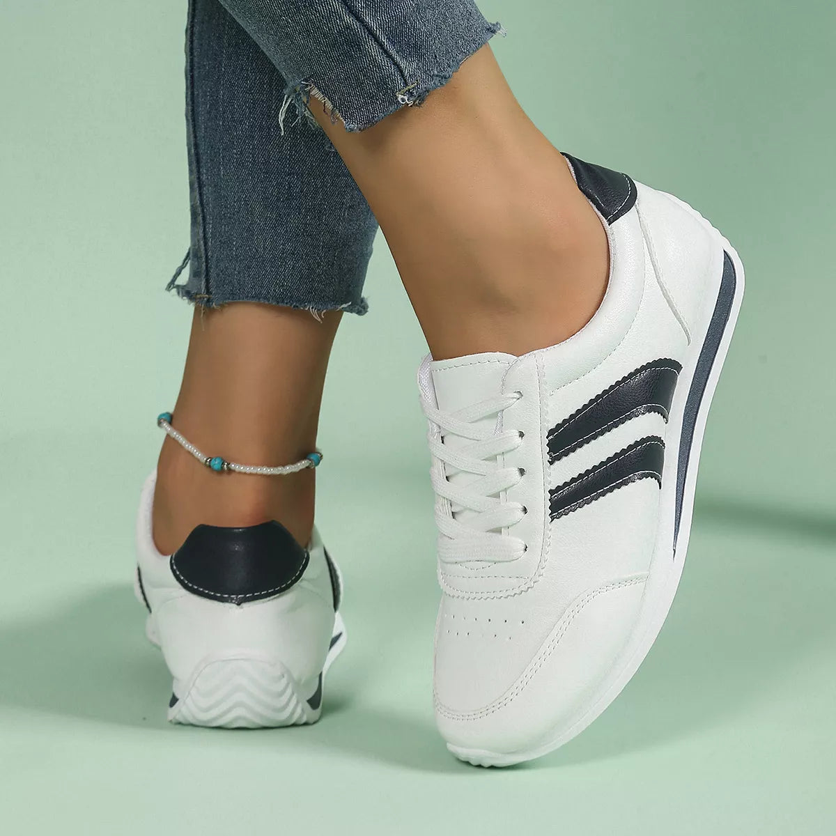 Women’s round toe lace-up sneakers by Trendsi, stylish casual sneakers with white soles and breathable fabric for everyday wear.