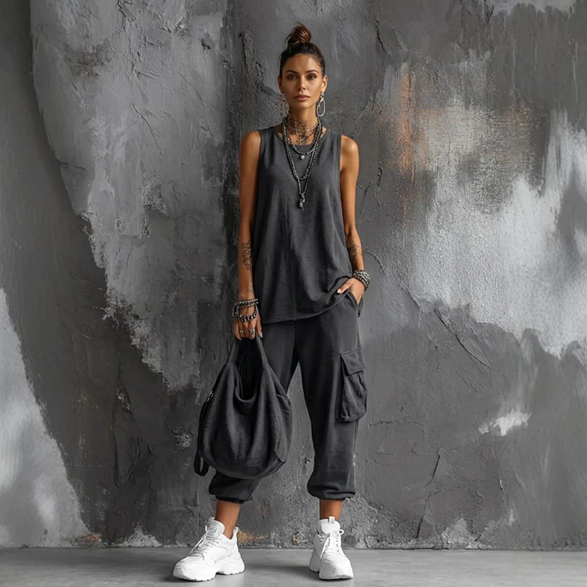 Women's sleeveless tank top and cropped ankle pants set by Plush Fashion Hub, featuring a stylish two-piece outfit in soft fabric.