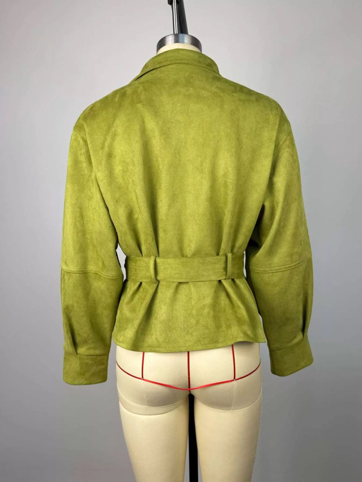 Women's tie waist long sleeve cropped jacket from Trendsi, featuring a fitted silhouette and stylish design.