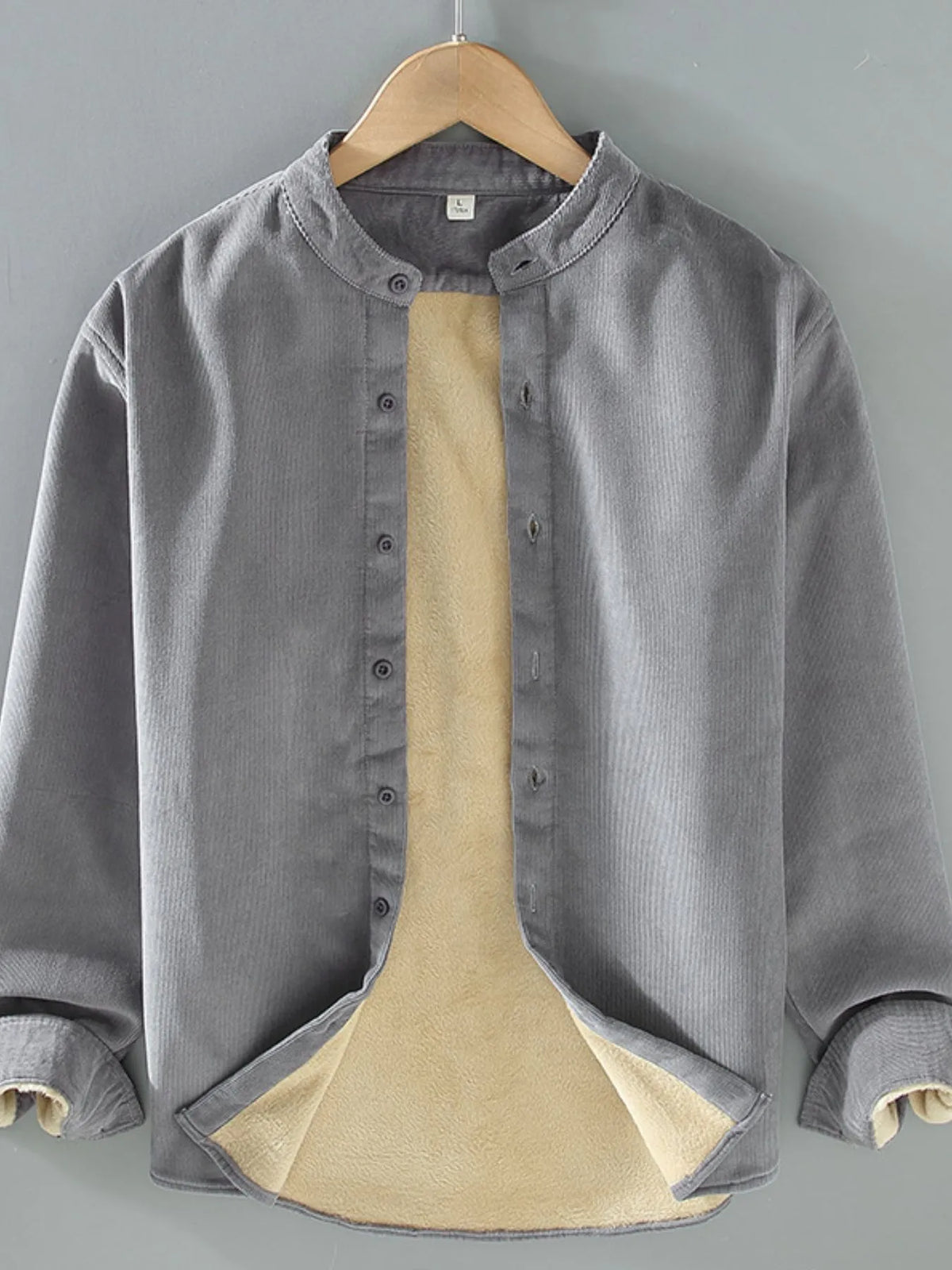 Men's plus size button-up long sleeve jacket from Trendsi, shown in a casual style with front buttons and a collar.