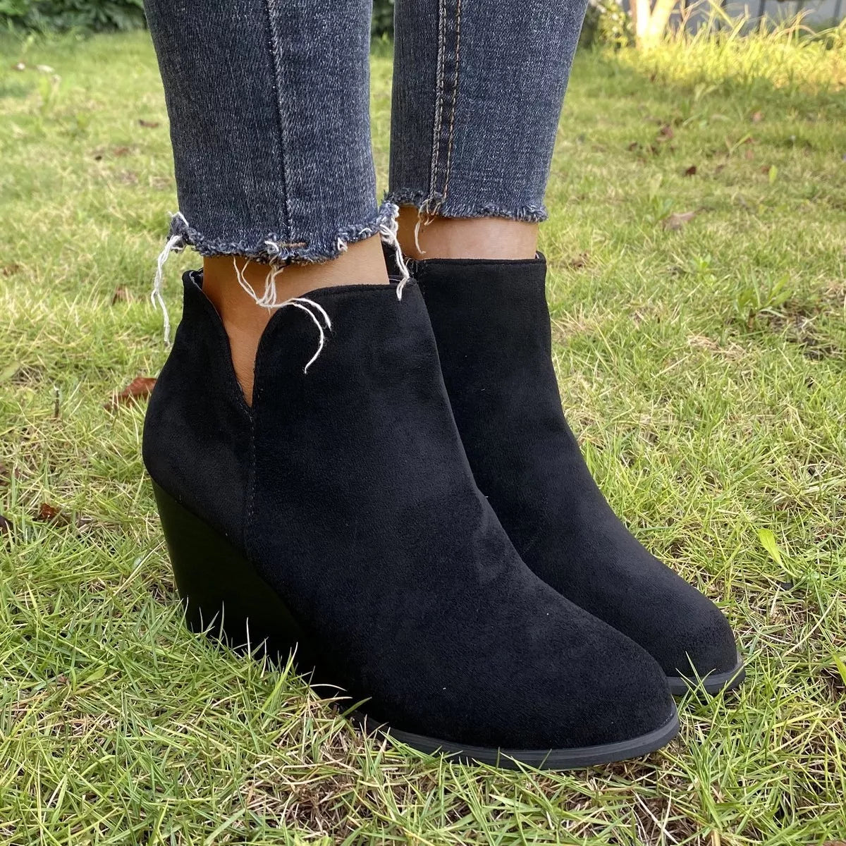 Trendsi round toe wedge ankle boots featuring a stylish design with a chunky heel and ankle height, perfect for casual wear.