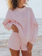 Trendsi relaxed fit round neck sweatshirt and shorts set, casual 2-piece loungewear outfit with comfortable fabric and relaxed style.