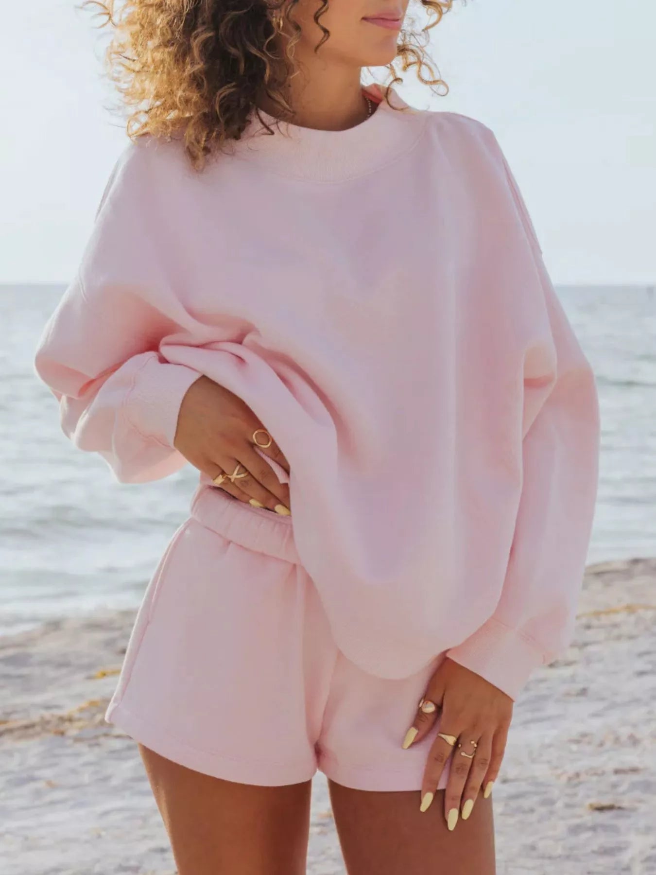 Trendsi relaxed fit round neck sweatshirt and shorts set, casual 2-piece loungewear outfit with comfortable fabric and relaxed style.