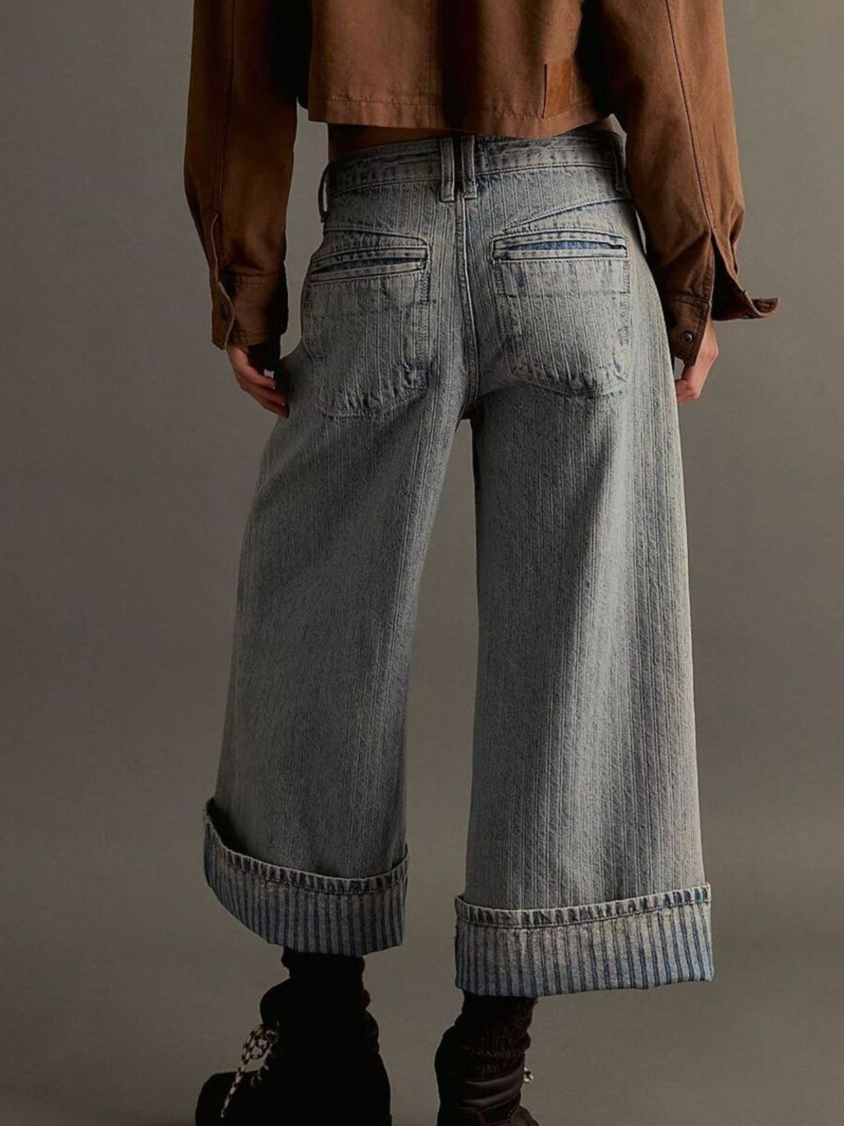 Plush Fashion Hub wide-leg cropped denim jeans with a relaxed fit and classic blue wash, displayed on a model.