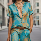 Women's bohemian printed resort two-piece casualwear set by FitiqueFit with 3/4 sleeve shirt and matching pants, vibrant and relaxed style.