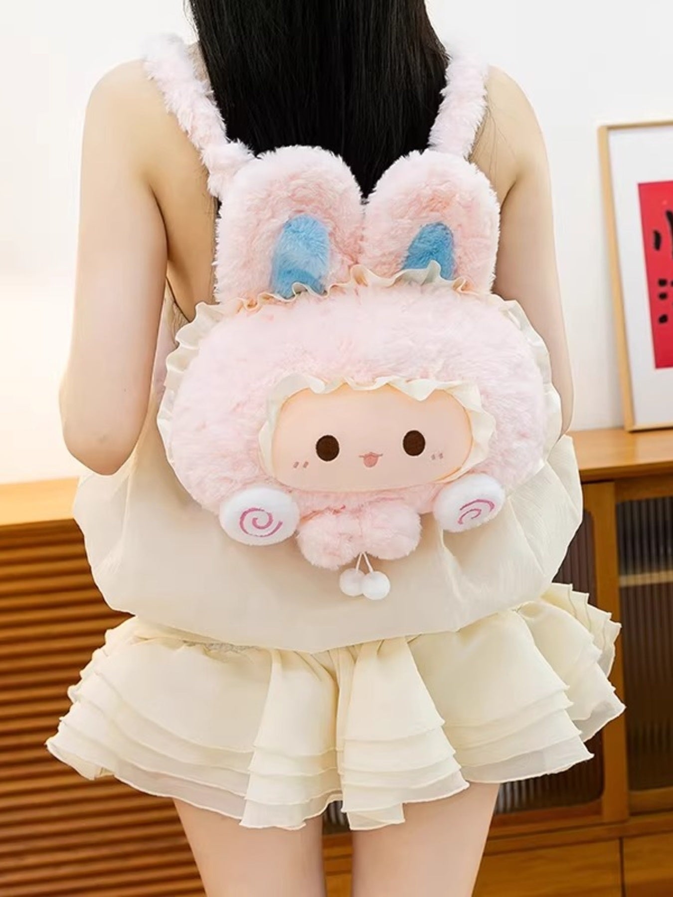 Soft plush bunny backpack by Trendsi featuring whimsical woolen design, perfect for a cute and cozy statement bag.