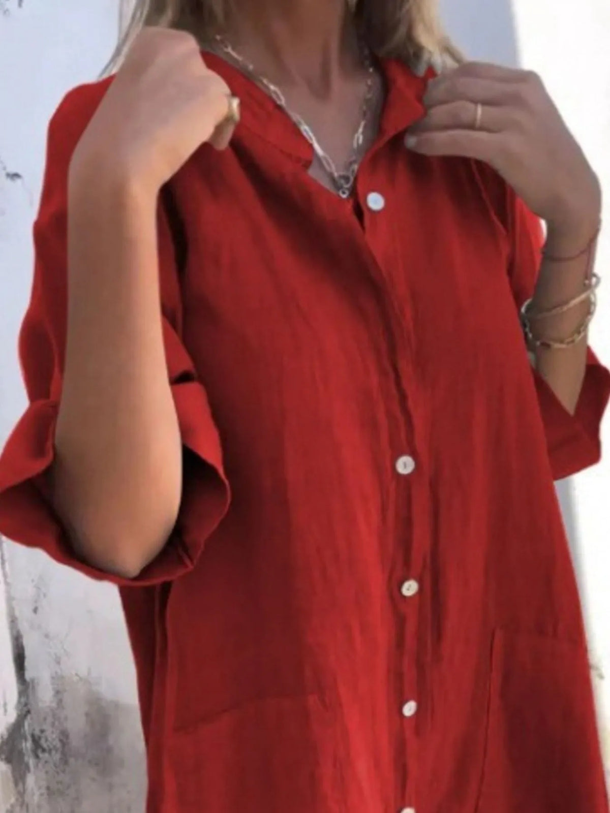 Full size casual linen button-down shirt dress by Trendsi, featuring a relaxed fit and classic collar, styled with rolled sleeves.