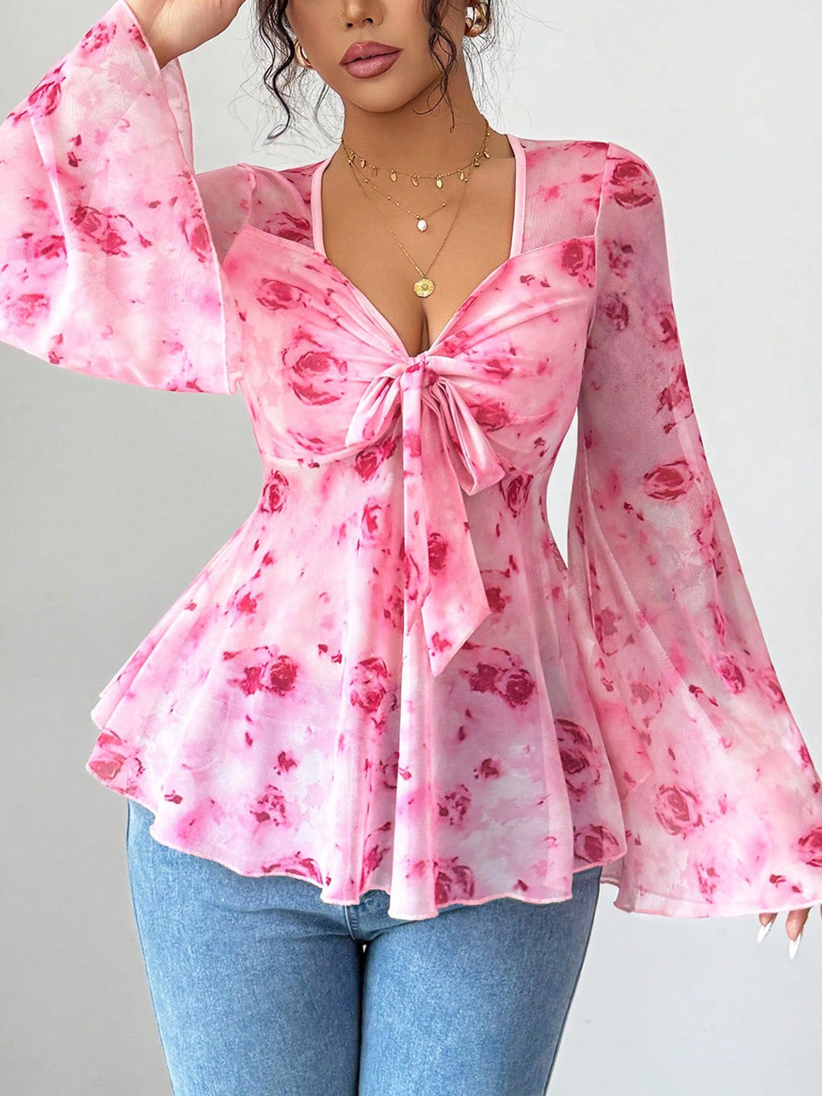 Floral print tie-front chiffon blouse with flare sleeves by Plush Fashion Hub, featuring a stylish, lightweight design.