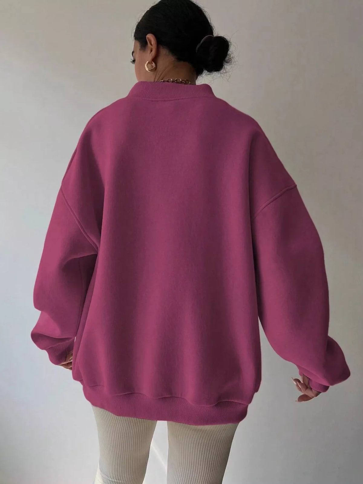 Oversized dropped shoulder long sleeve sweatshirt by Trendsi, soft fabric with relaxed fit and casual style, shown in a neutral color.