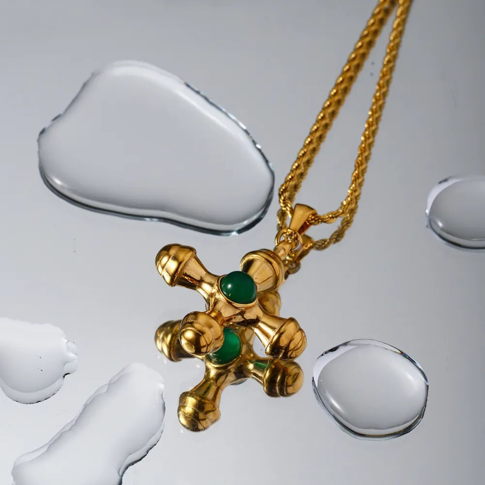 Gold-plated stainless steel cross pendant necklace with sleek design, perfect for everyday wear and stylish accessorizing.