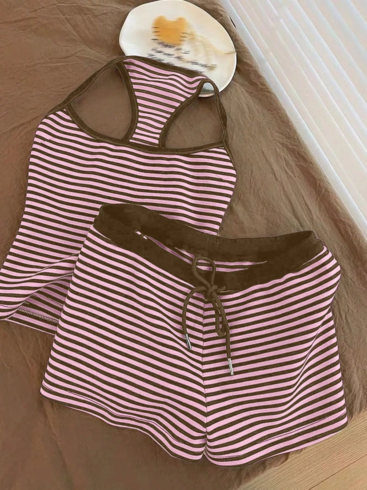 Striped tank top and shorts set from Plush Fashion Hub, casual summer outfit with blue and white stripes on the tank and matching shorts.
