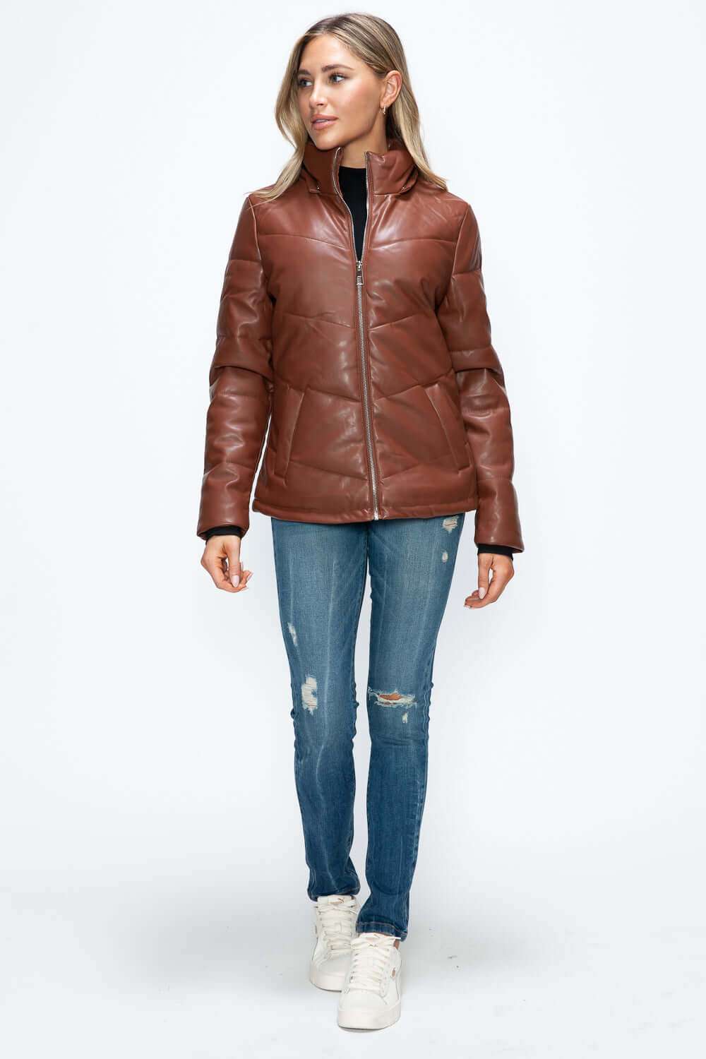 Pocketed Zip Up Puffer Jacket with Removable Hood in pleather.