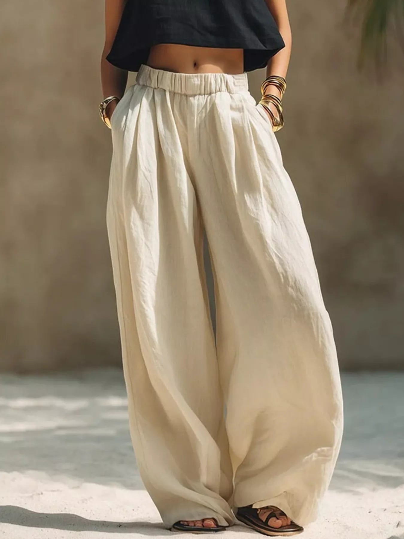 Plus size wide leg pants with full elastic waistband by Trendsi, showcasing flowy fabric and comfortable fit.