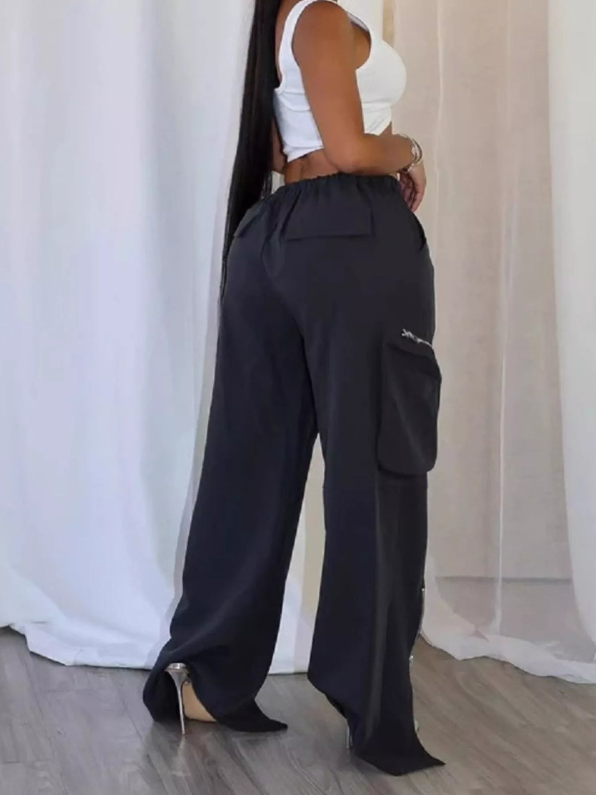 Trendsi drawstring cargo pants with zipper accents, featuring multiple pockets and a relaxed fit for casual style.