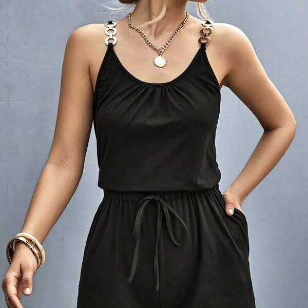 Women’s chain detail suspender jumpsuit from Plush Fashion Hub, casualwear with adjustable straps and a stylish, modern design.